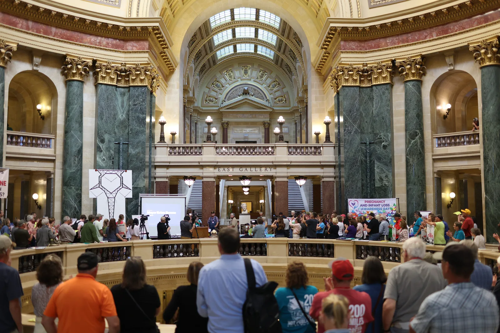 Photo 29 of 34. A wide view of the crowd in the Capitol Rotunda.